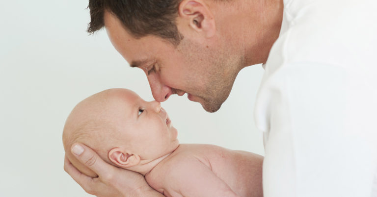Dad Gained Fame For His Reaction to Holding His Rainbow Baby. Watch Him Catch His Son at Birth. - Featured image