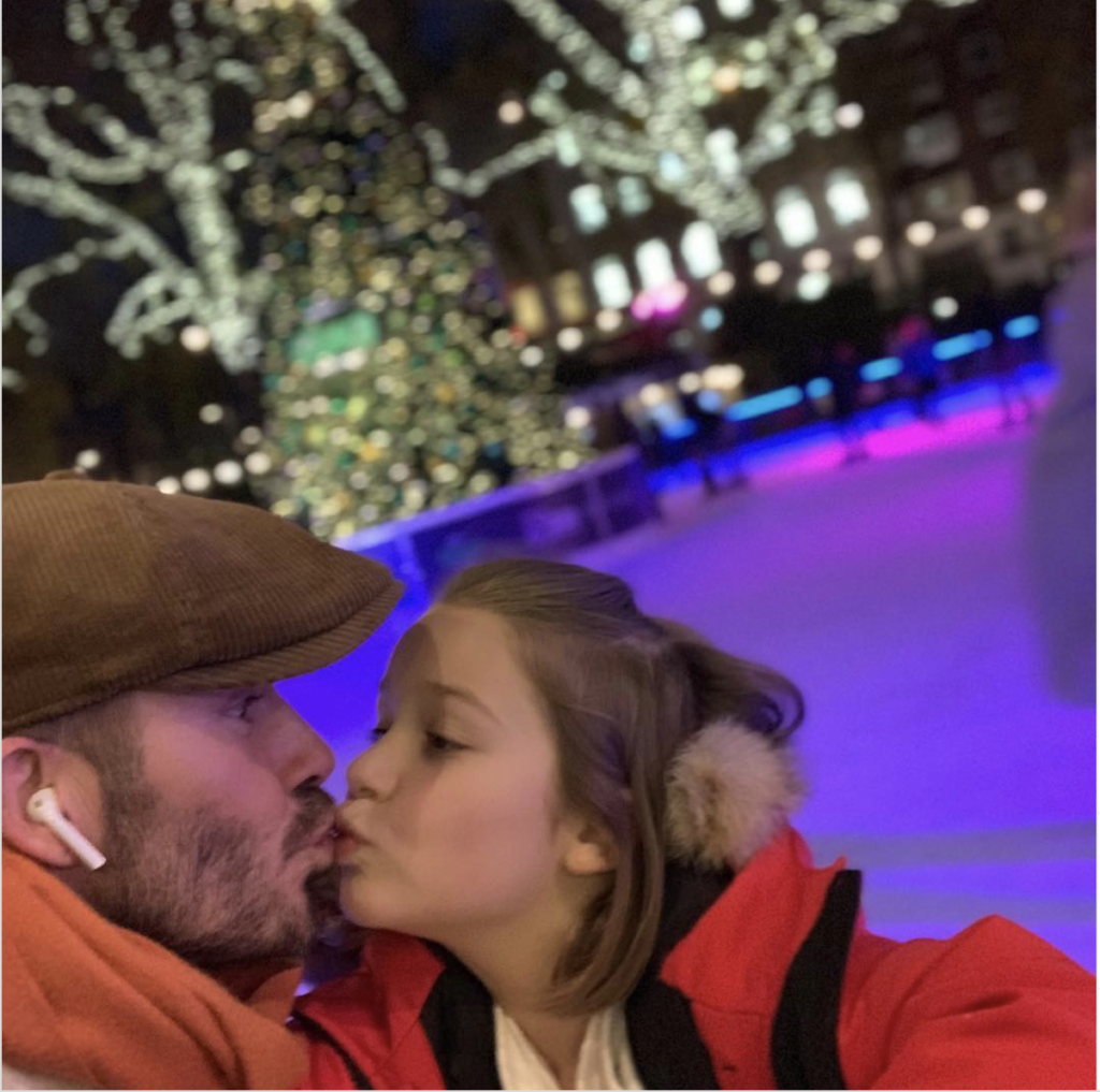 David Beckham kissing daughter on the lips. 
