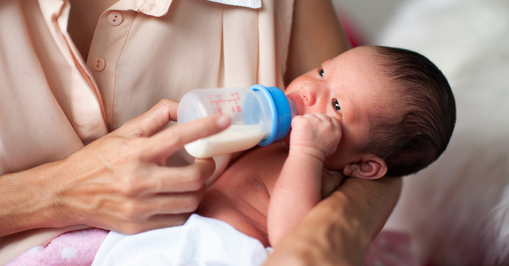 Woman Shocked To Discover Mother-In-Law Breastfeeding Baby On Nanny Cam - Featured image