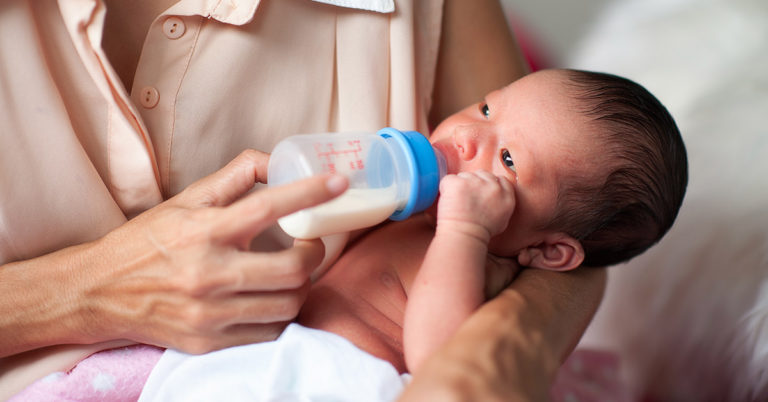 Woman Shocked To Discover Mother-In-Law Breastfeeding Baby On Nanny Cam - Featured image