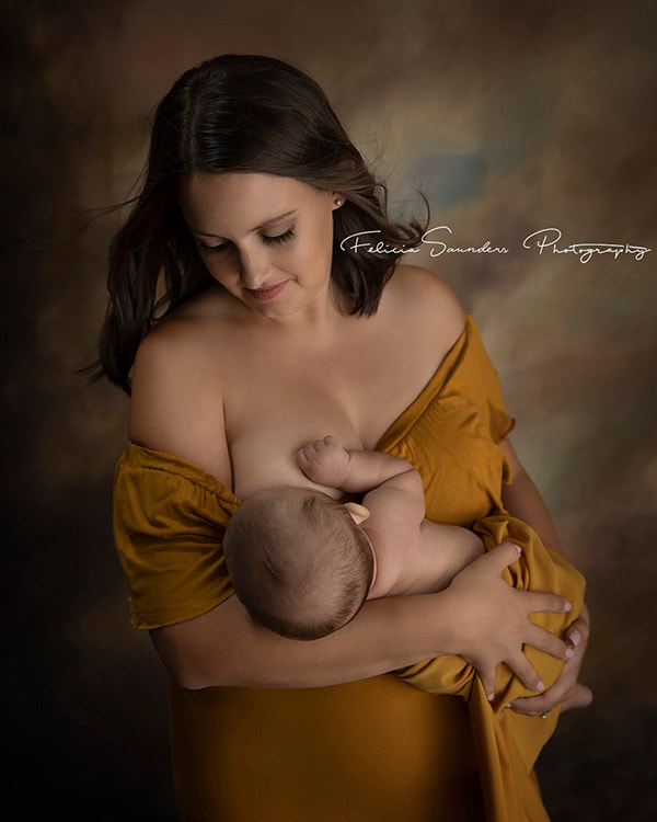 Portrait of a mother breastfeeding her baby to celebrate that feeding a baby is beautiful no matter how a mother chooses to do it.