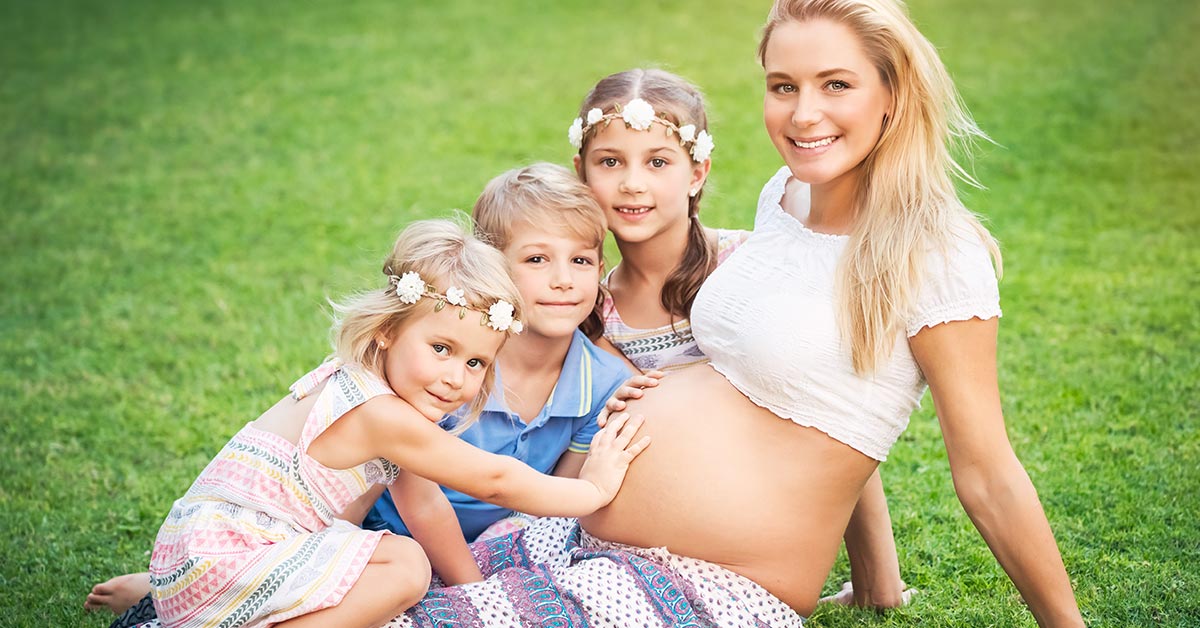 pregnant mother with 3 daughters