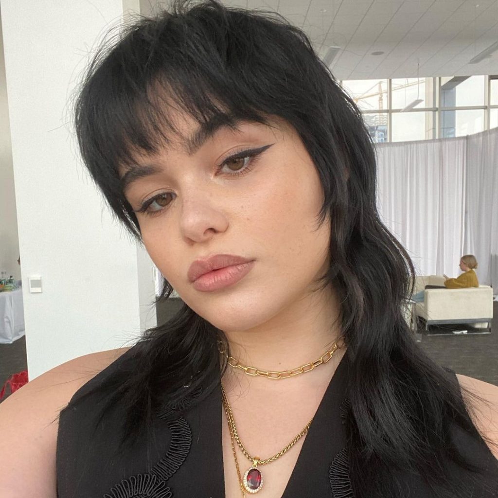 model, dark hair, mullet, necklace