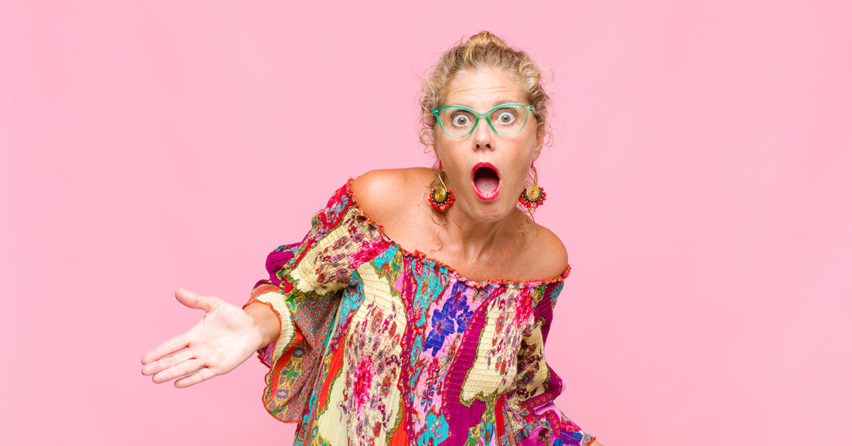 surprised woman wearing colourful clothing