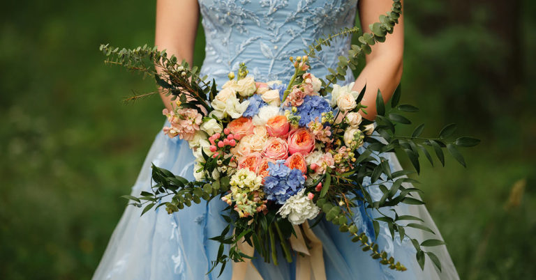 Bride Accused Of ‘Tearing Her Family Apart’ By Choosing To Wear A Blue Wedding Dress - Featured image