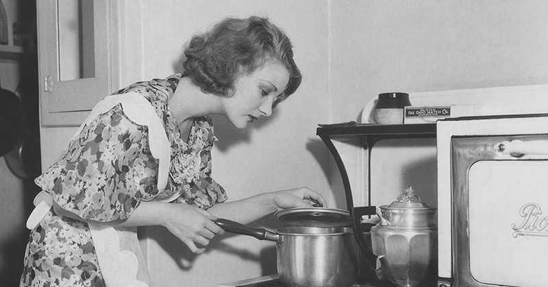 old photo of woman in the kitchen