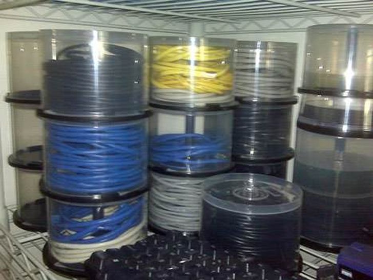 CD cases for cable storage.