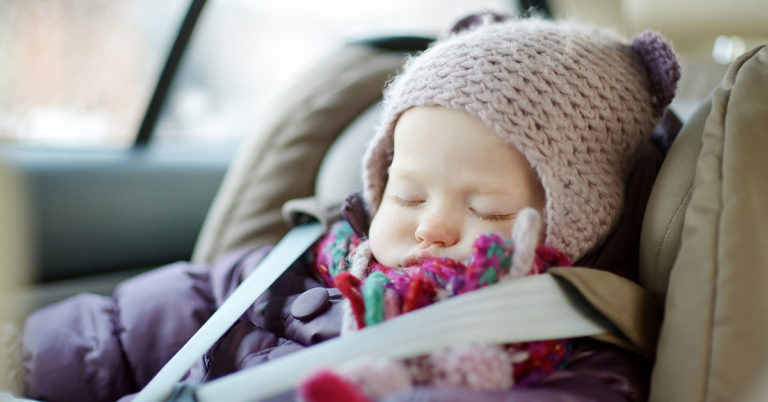 Parents warned over dangers of your children wearing winter coat inside cars - Featured image