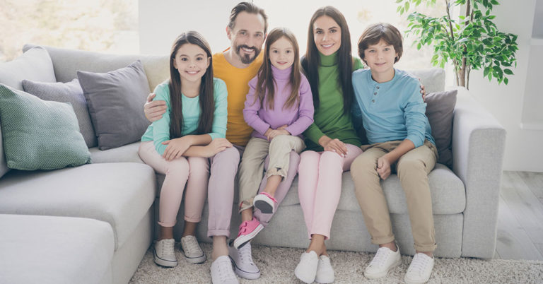 Couple adopts neighbor’s 3 children after she passes and then the community rallies together - Featured image