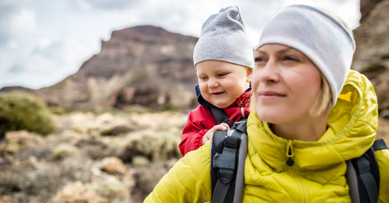 Mom Carries Disabled Son On Her Back As She Promises To Take Him To Travel The World - Featured image