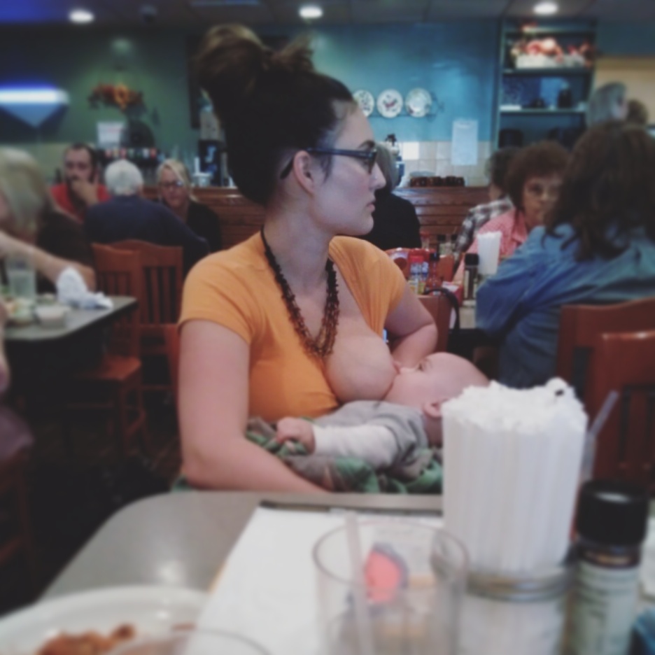 Ashley Kaidel breastfeeds her baby at a public restaurant without a cover.