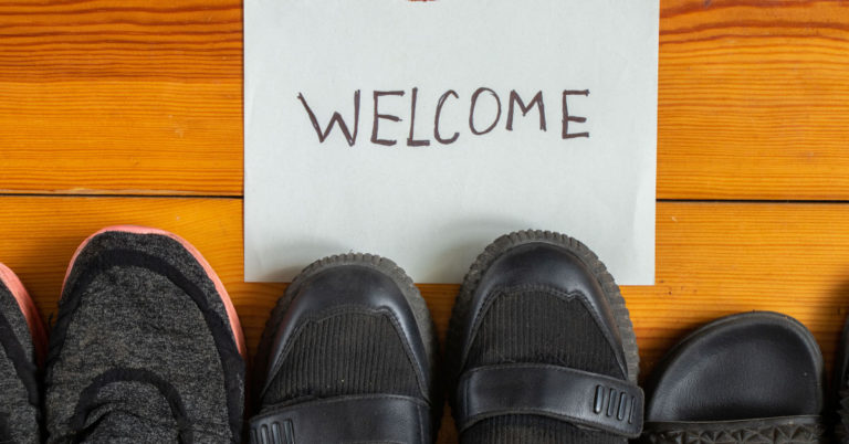 Is It Rude to Ask Guests to Take Off Their Shoes When Entering Your Home? - Featured image