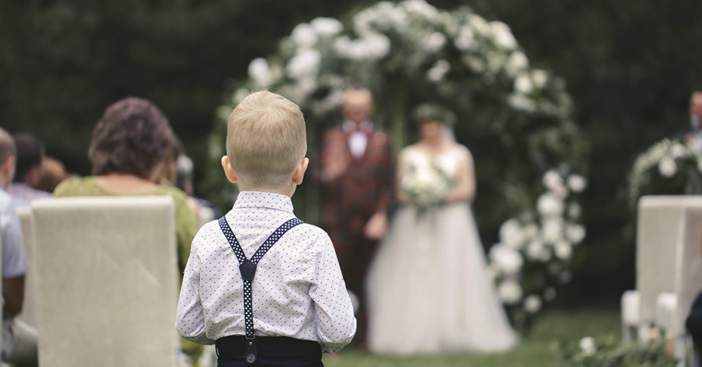2-year-old steals the show at mom’s wedding after running down the aisle to greet her - Featured image