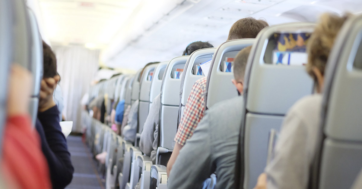 passengers sitting on airplane