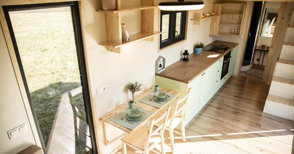 Family buy tiny house and park it right outside their home to put their 3 teens in it - Featured image