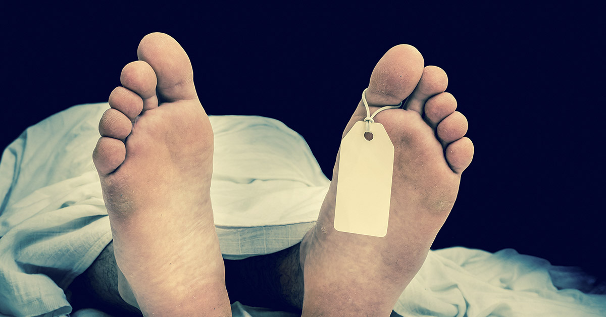 dead body with ID tag on feet. Morgue setting