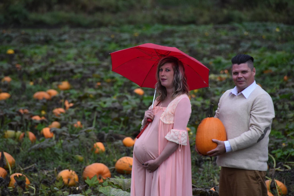 Maternity shoot in pumpkin field