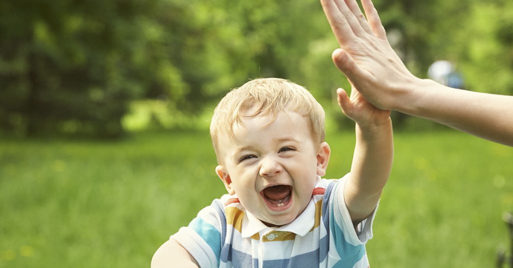  A Parenting Columnist Says Adults Shouldn’t High-Five Kids. Yes, Really - Featured image