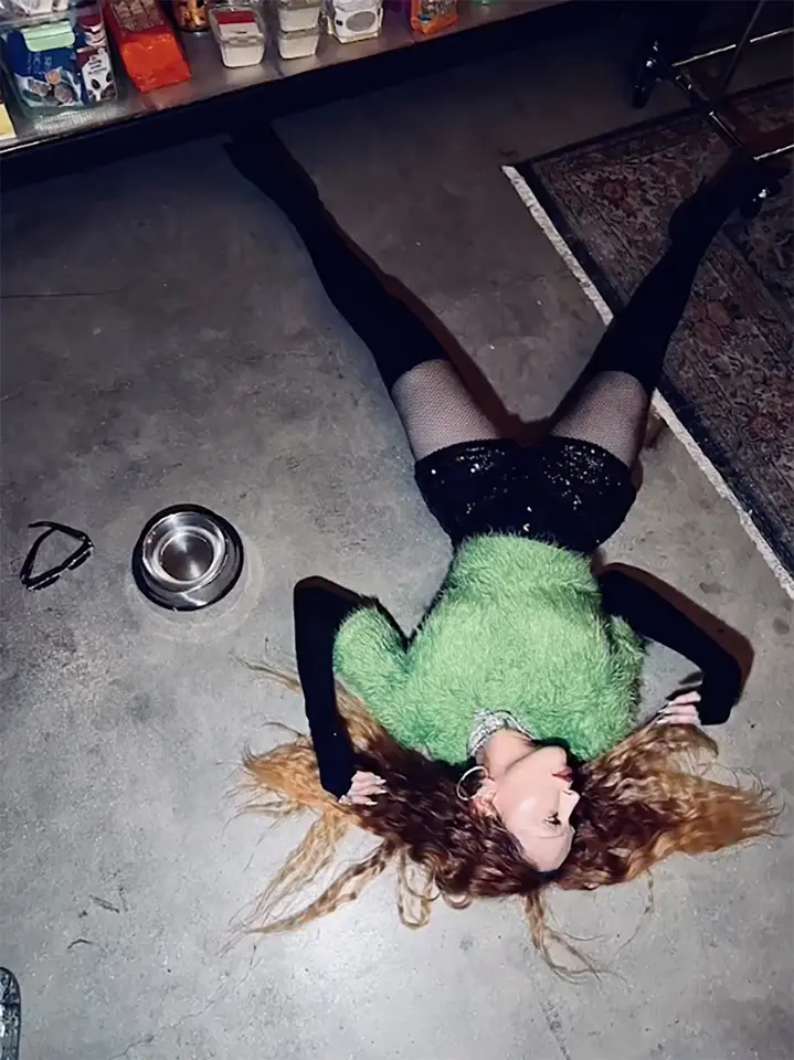 Madonna laying on the floor 