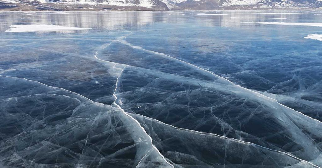 Boy ‘died trying to save his friends’ after they fell into frozen lake - Featured image