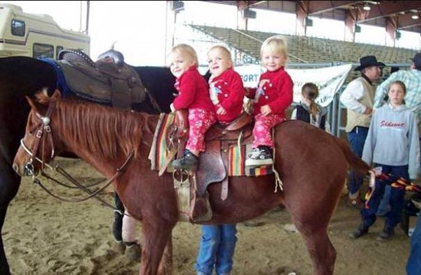 The three garrison girls on a pony