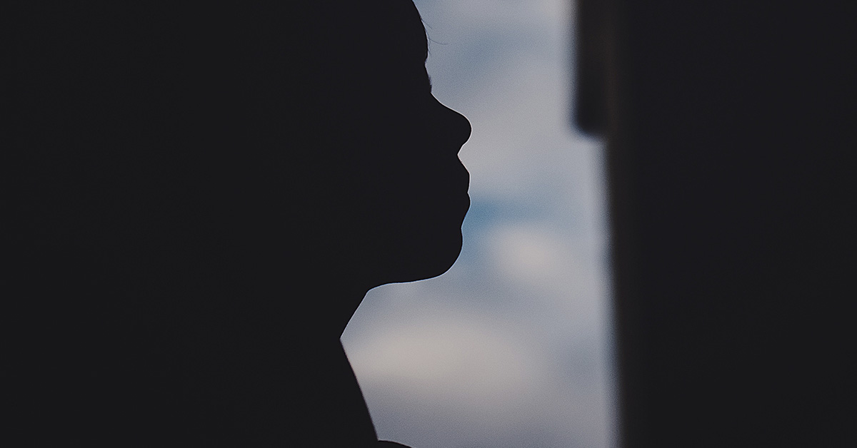 silhouette of young boy