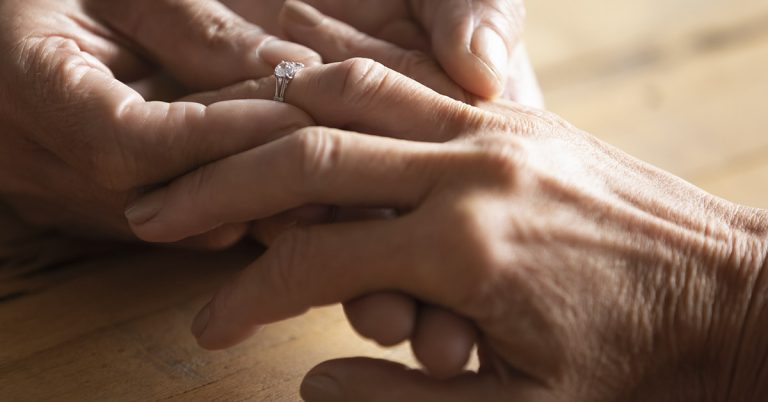 Watch the unforgettable moment a man proposes after rekindling high school romance 60 years later - Featured image