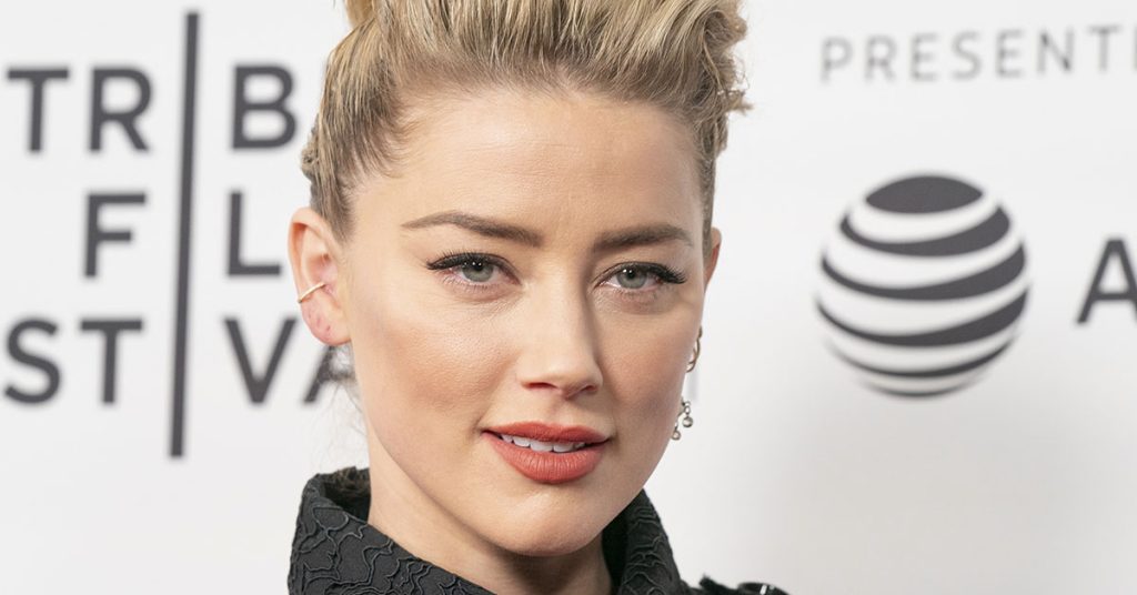Amber Heard Has Reportedly Changed Her Name And Moved Continent - Featured image