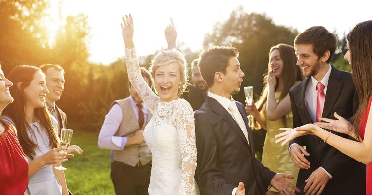 Every Wedding Guest Dress Code, Explained - Featured image