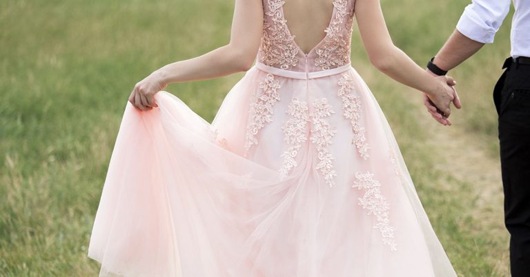 Woman Criticized For Going Against Tradition By Donning Pink Dress For Her Wedding - Featured image