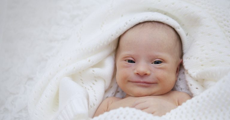 Single mother with Down syndrome raises son with same condition. This is her story. - Featured image