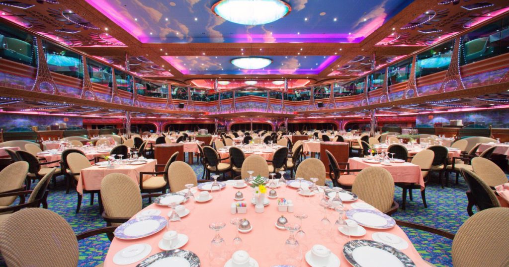 CARNIVAL "CONQUEST" - 4 AM. JUNE 5, 2008: Renoir Forward Restaurant. Cruise ship main dining room for over 1,000 seats is awaiting for new guests.
