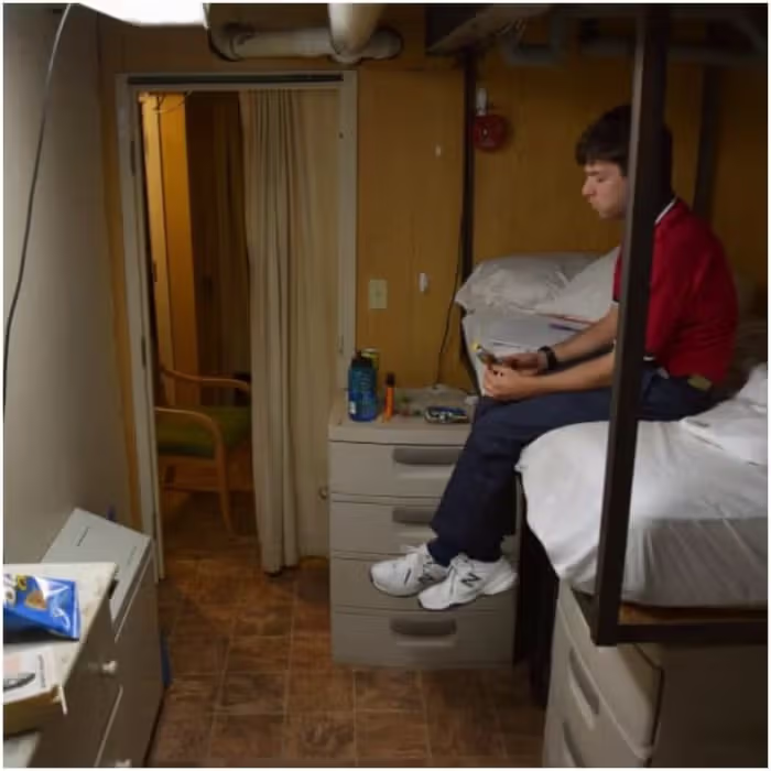cruise ship worker in bunk