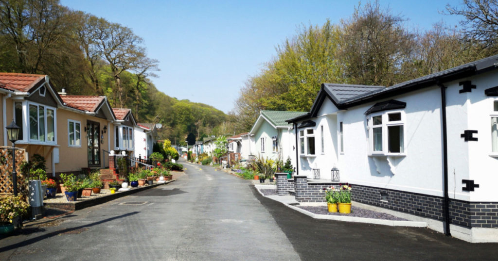 Swansea, UK: April 27, 2019: Residential mobile homes for retired persons only with gardens and car parking spaces.

