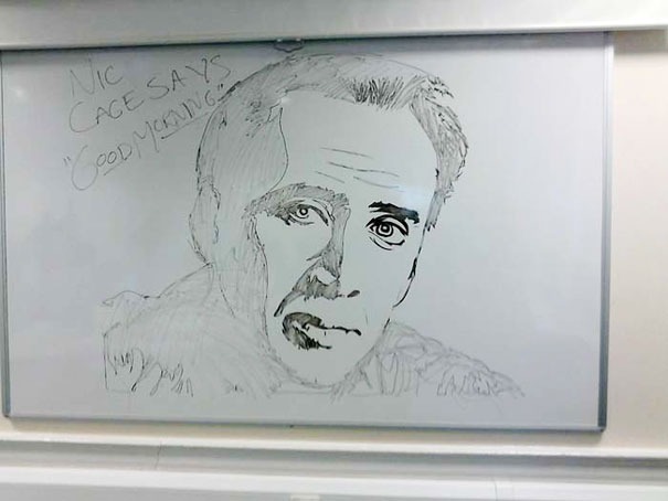 Drawing of Nicolas Cage on a whiteboard