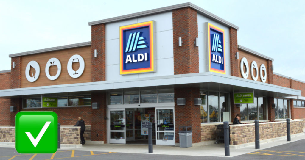 Aldi store front with green check mark overlay 