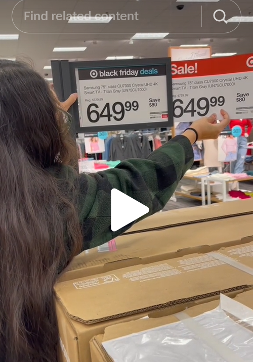 Woman holding to price tags
