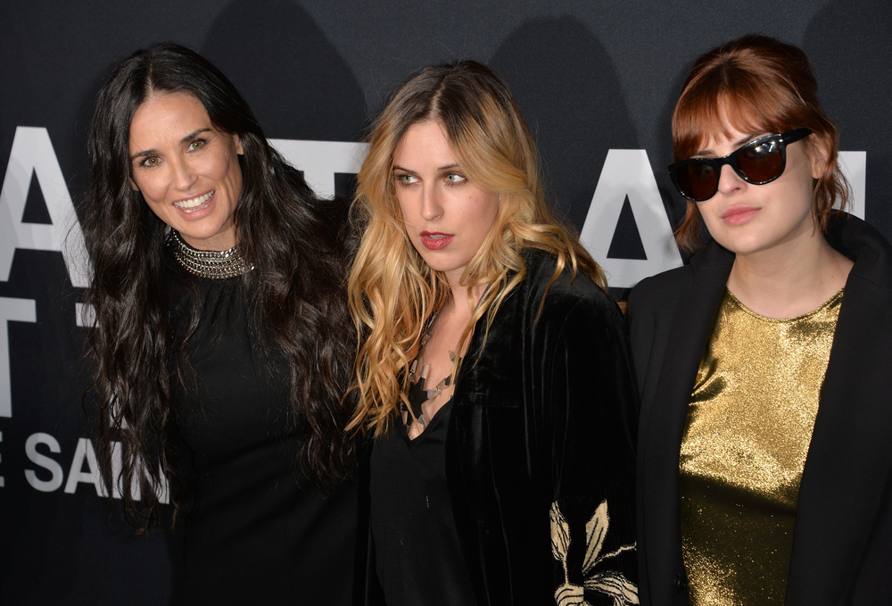 LOS ANGELES, CA - FEBRUARY 10, 2016: Demi Moore & daughters Tallulah & Rumer Willis arriving at the Saint Laurent at the Palladium fashion show at the Hollywood Palladium.