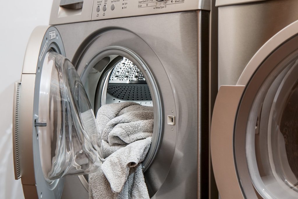 Stock image of washing machine with laundry