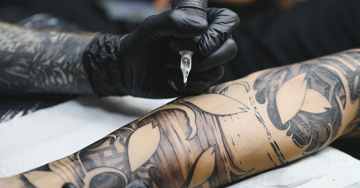 arm getting tattooed