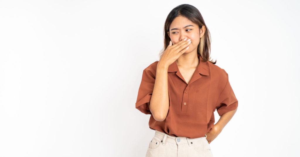 People Are Wondering What This Bizarre ‘Nose Cover’ Trend Gen Zers Are Doing in Photos - Featured image