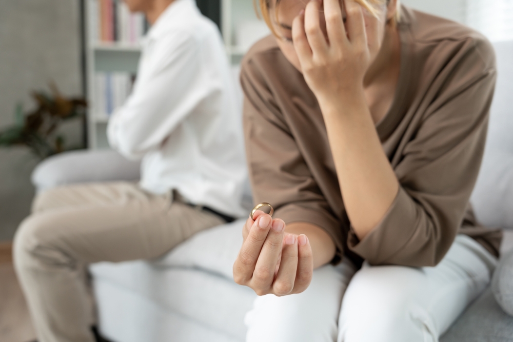 Quarrel, Divorce. husband and wife remove married ring. Couples desperate and disappoint after marriage. Divorce document, upset and frustrated after conflict. distrust, love problems, betrayals