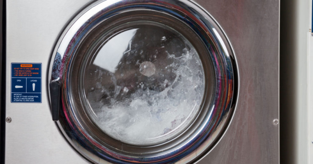 Closeup of water spinning in washing machine