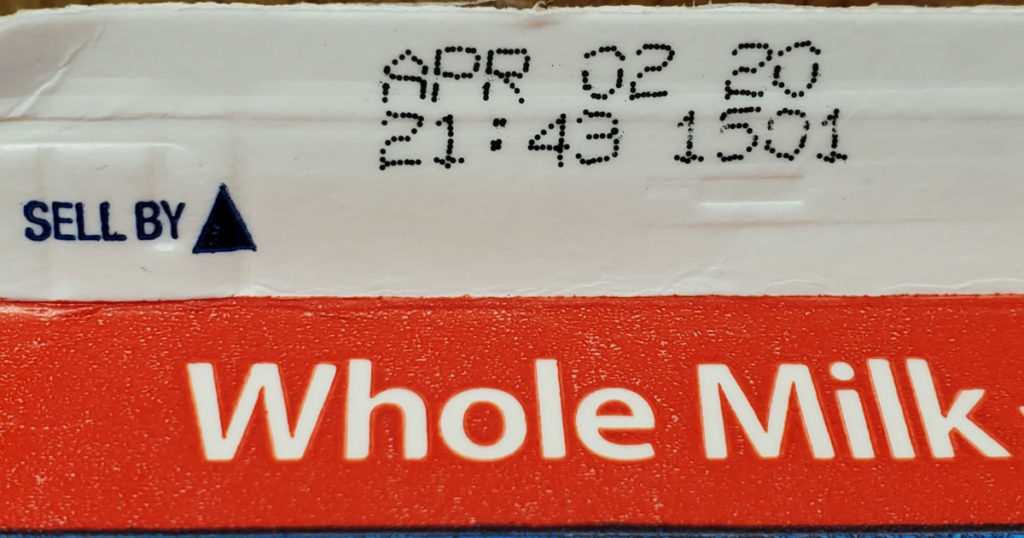 Food expiration date information on milk box.