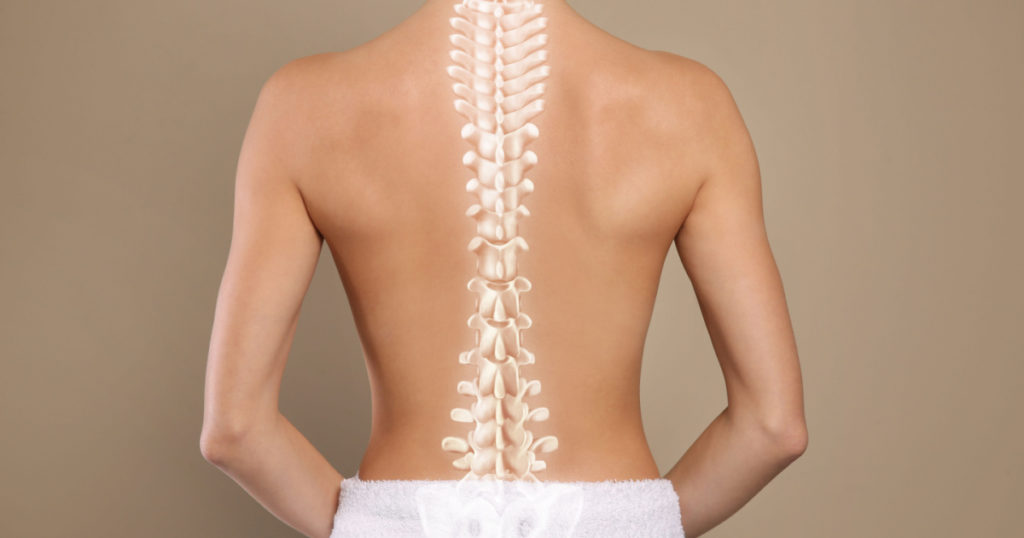 Woman with healthy back on beige background, closeup. Illustration of spine