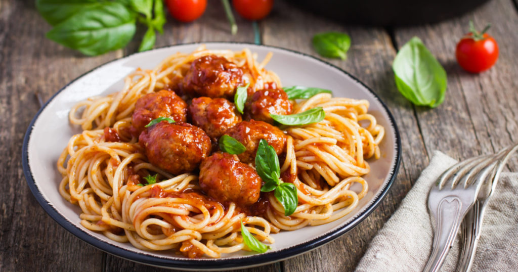 Spaghetti pasta with meatballs and tomato sauce, selective focus