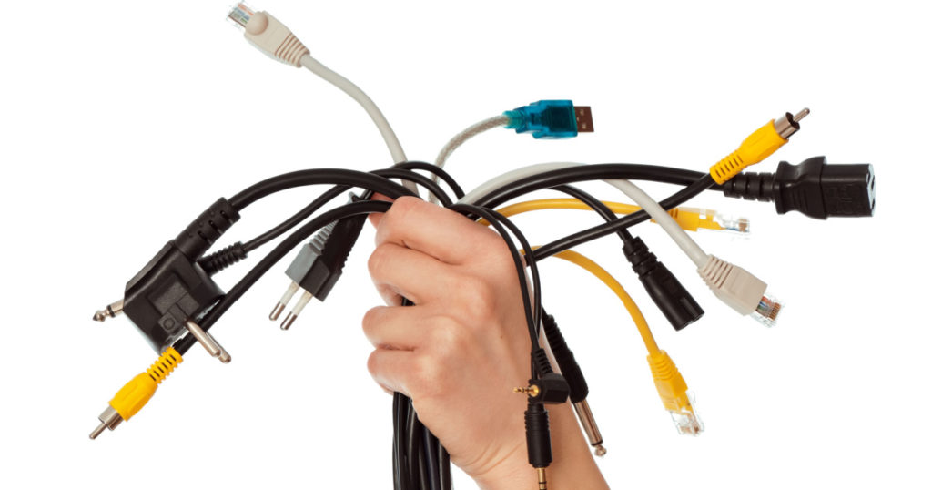 woman taking different cables in the hand