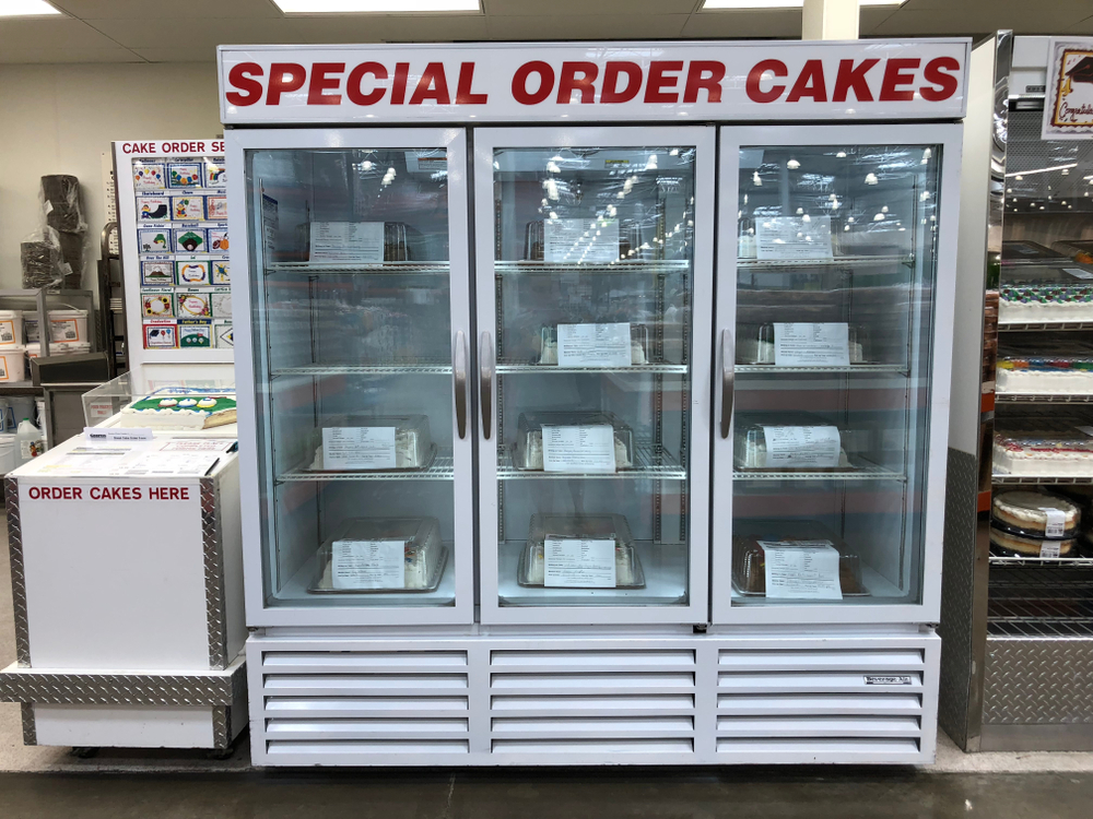 JUNE 13 2018 - MAPLE GROVE, MN: Special Order Cakes display inside of a Costco Warehouse store, in the bakery department. Costco sells sheet cakes with customization designs