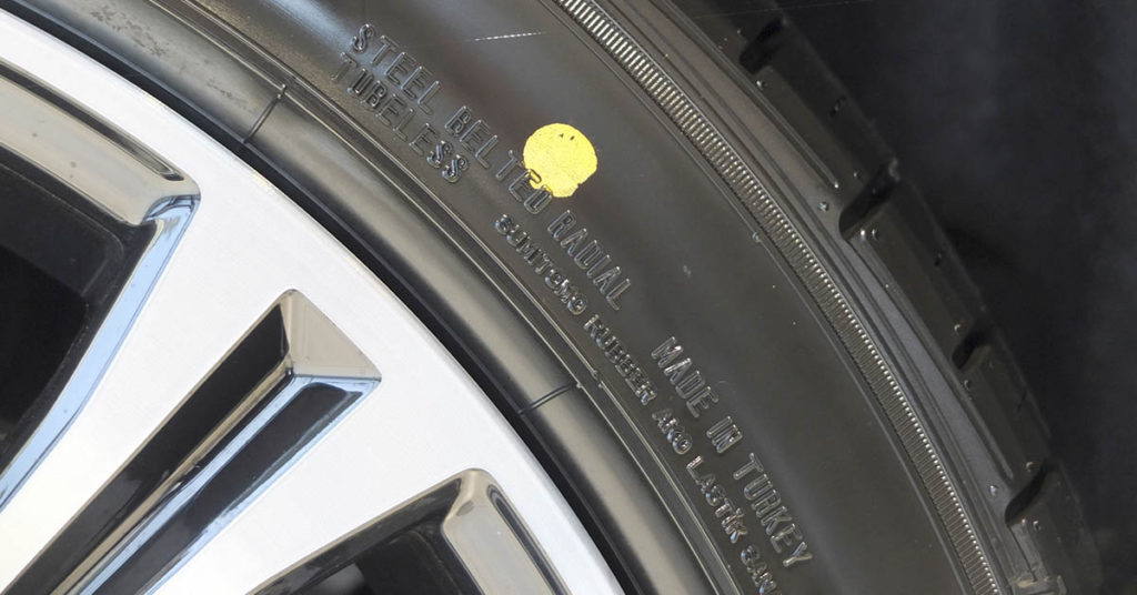 What Do Yellow or Red Dots on Your Tires Mean? - Featured image