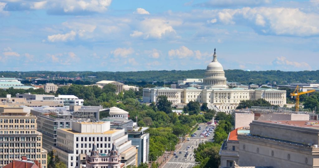Washington DC - Aerial view of Pennsylvania street with federal buildings including US Archives building, Department of Justice and US Capitol